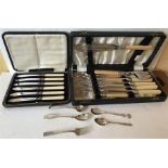 Two boxes of plated cutlery including fish knives and forks and various plated spoons etc...