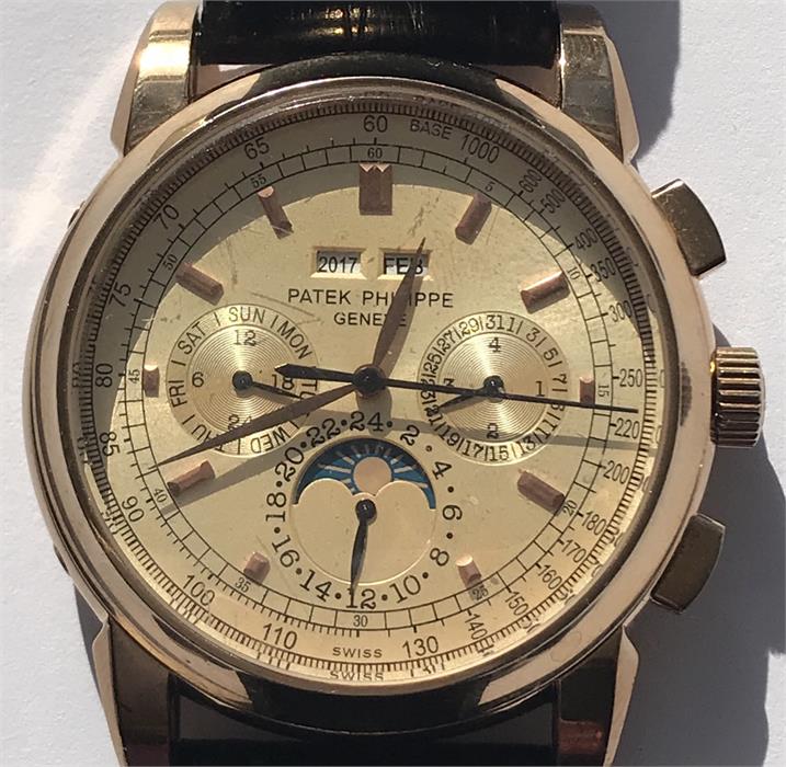 A replica Patek Philippe Geneve watch - kinetic movement -58152