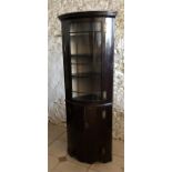 Bow front mahogany double height corner cupboard