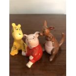 Set of 7 Winnie the Pooh figures (1 head re-stuck)