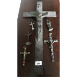 Five crucifix and a figure