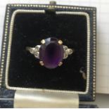 18ct yellow gold ladies dress ring set with amethyst and diamonds - size O