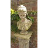 Reconstituted stone female bust on pillar