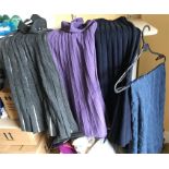 Four cashmere/wool skirts - size m/l