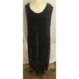 1920’s Black silk crepe beadwork evening gown