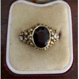 Good 18ct gold dress ring with Garnet? and diamonds size N