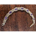 9ct gold and amethyst bracelet 15.3 gms gross wt.