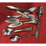 Eight silver items inc butter knives etc.