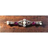 Good quality diamond, ruby and pearl bar brooch (1 missing pearl)