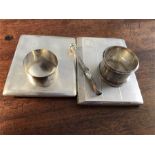 Two silver cigarette cases , 2 napkin rings and a silver pencil