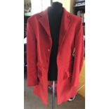 A red gentleman’s hunt jacket lacking buttons to front, size L, retailed by Harrods