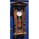 Good quality triple weight Vienna wall clock with well carved case