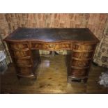 Reproduction serpentine front mahogany kneehole desk