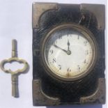 Small leather bound desk clock with silver mounts by William Thornhill & Sons
