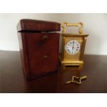 Good brass carriage clock with original shagreen case and key