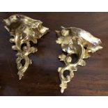 Two miniature rococo gilt wall brackets 9cms h