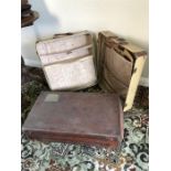 Vintage suitcase and small travel wardrobe