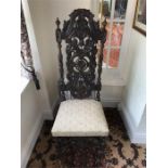 Early 20thC carved oak highback chair