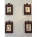 Four decorative wall plaques