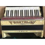 A cased Frontalini piano accordion