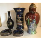 Five pieces of Lustre ceramics to include two Carlton Ware ashtrays, Carlton Ware vase, Crown Devon