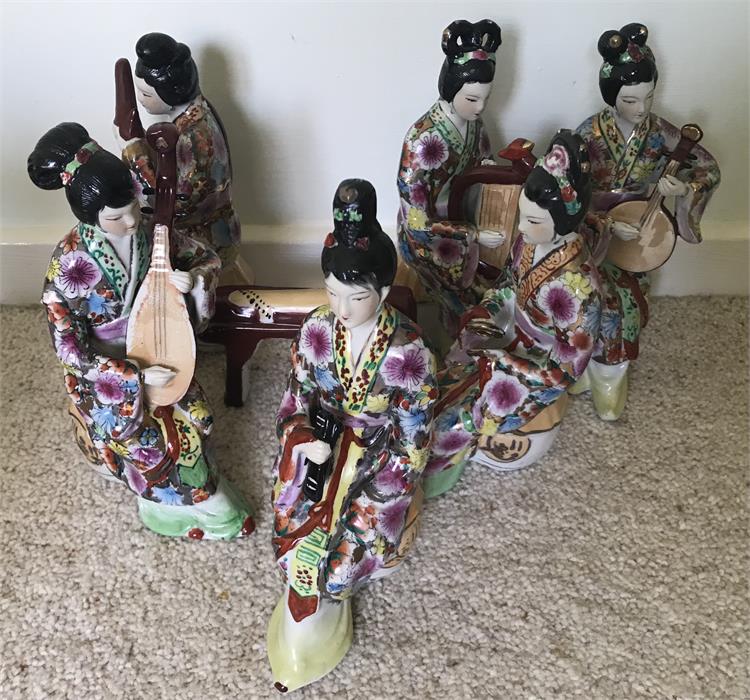 Six 20th Century oriental figures plus musical instrument