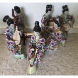 Six 20th Century oriental figures plus musical instrument