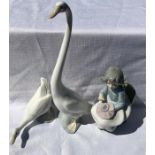 Three Nao figures by Lladro including two ducks 30cms tallest.