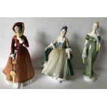 Three Royal Doulton figurines.