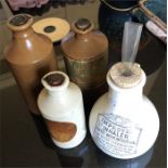 Three stoneware ink jars and an inhaleer
