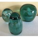 Three 19th C green glass dumps, larger marked H.A. 1883