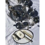 A quantity of silver plated wear including tea service, candelabra, dressing table set etc.