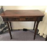 19th Century fold over mahogany tea table inlay to front and acanthus leaf decoration to side. 91cms
