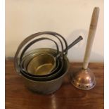 Four brass pans and a posher