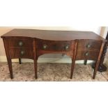 A 19thC mahogany sideboard with serpentine front and lion mask brass handles with string inlay