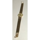 Ladies 9ct gold Omega wristwatch and bracelet.