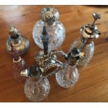 A collection of perfume bottles etc, mostly silver mounted, good used condition