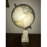 A good quality desk globe by George F. Cram Company. mounted on a granite base, 40cms h