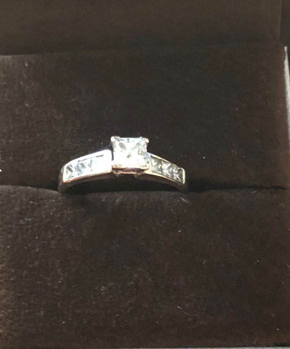 An 18ct white gold and diamond solitaire ring size R