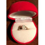 Opal and diamond ring set in 14 ct.gold size O