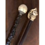 Two decorative walking sticks