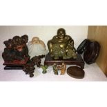 Various Chinese objects including wooden dog of Foo, Buddhas in brass 21cms h & ceramic, stands