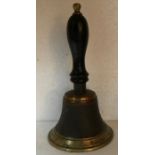 A 19thC brass hand bell - 24cms h