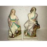 A pair of early 19thC Staffordshire figures with restoration and nibbles.
