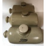 Three stoneware hot water bottles