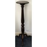 Carved mahogany torchere - glued leg