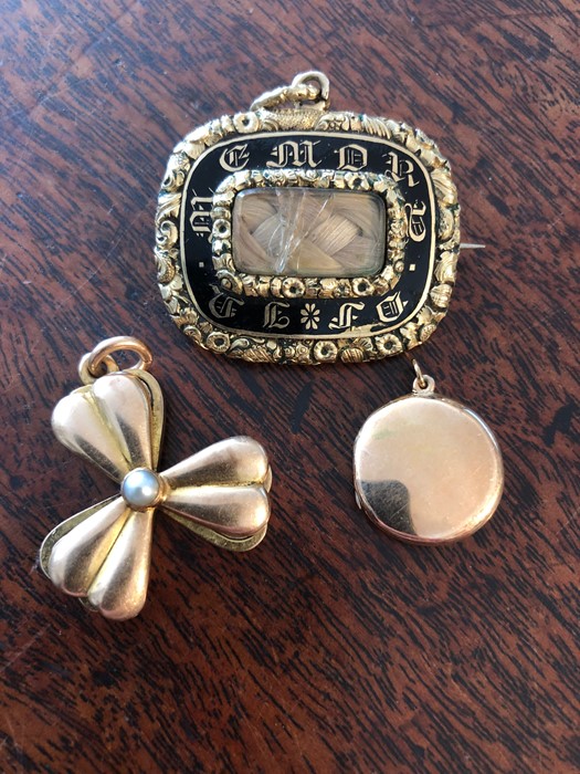 Three 19th c lockets inc.small round one marked 15ct