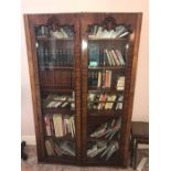 A 19thC mahogany bookcase, two glazed doors, veneer slightly a/f 124 w x 192 h x 33cms d