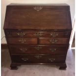 18thC mahogany bureau on ogee bracket feet with replacement handles and feet