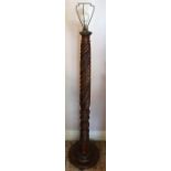 Carved mahogany standard lamp